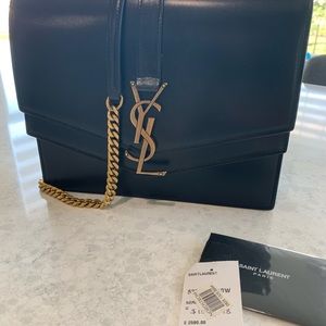 Saint Laurent YSL shoulder bag. Color: Black, Gold